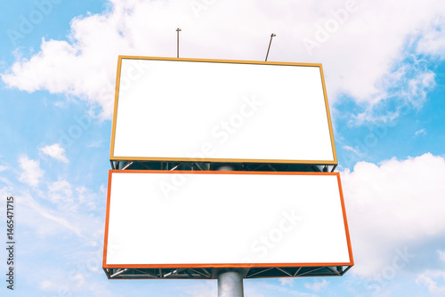 Empty two mockup, billboard or screens on the background of the sky with clouds.