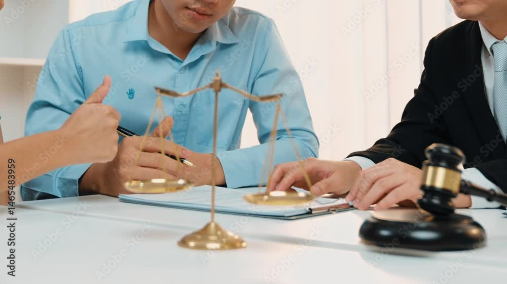 Lawyer act as mediator offer a compromise between two parties to resolve business dispute through negotiation at law firm office. Legal mediation and conflict resolution service. Slow motion. Rigid. Lawyer act as mediator offer a compromise between two parties to resolve business dispute through negotiation at law firm office. Legal mediation and conflict resolution service. Slow motion. Rigid.