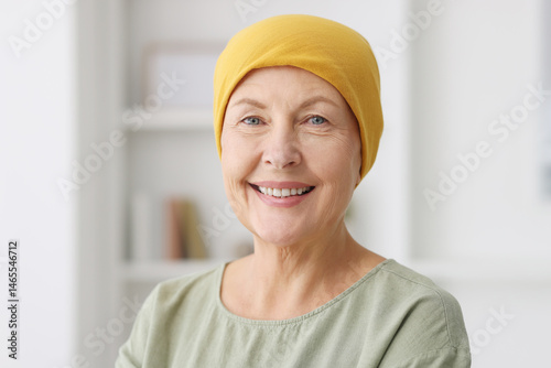 Fotografie Portrait of senior woman with cancer at home