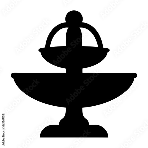 Silhouette of a two tiered water fountain structure on a white background