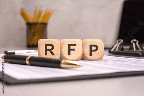 Принти на полотні RFP abbreviation on wooden cubes on business document with pen