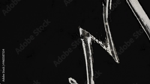 White Paint Strokes Creating Dynamic Patterns On Black Background