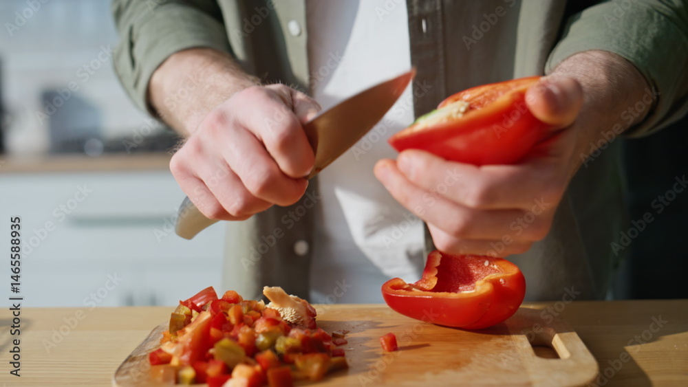 Man hands preparing vegetables ingredients for salad on home kitchen closeup.