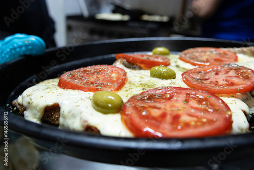 Neapolitan Milanese taken out of the oven - Argentine food