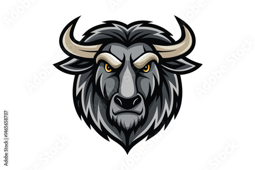 Fierce wildebeest head with gray fur and sharp horns intensely stares forward vigilantly