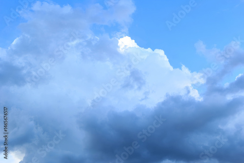Fototapeta Naklejka Na Ścianę i Meble -  Vast Blue Sky Filled With Patchy White Cumulus Clouds and Stunning Horizon Views in Daylight