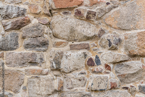 Obraz na płótnie Patterns in the stone wall of a historic fortress. w salonie
