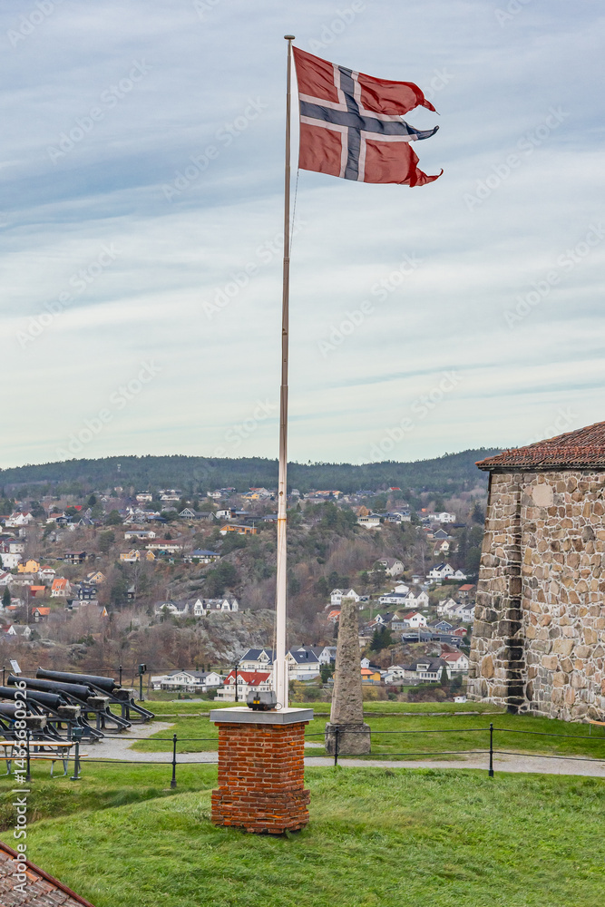 Norwegian flag flying at the historic Fredriksten Fortress.