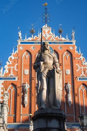 Statue of Knight and St. Peter's Church Spire in Riga, Latvia