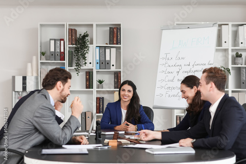 Female lawyer working with ...