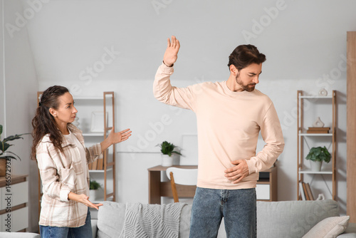 Unhappy couple quarreling a...