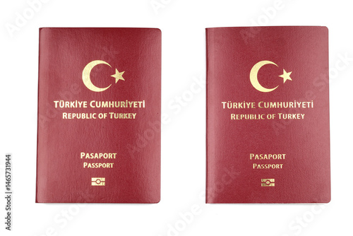 2 Turkish passports lying side by side isolated on a white background
