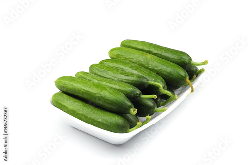 many cucumbers in package isolated on white background