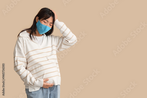 Pregnant Asian woman in med...