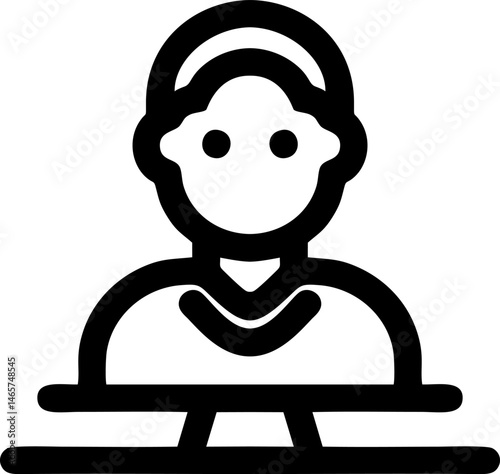 Person wearing headphones at desk