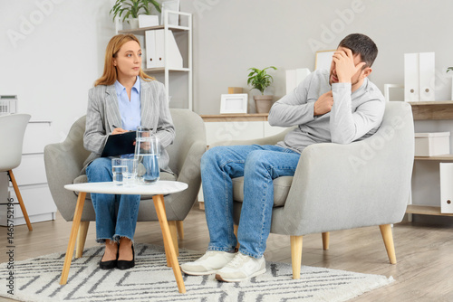 Female psychologist working...