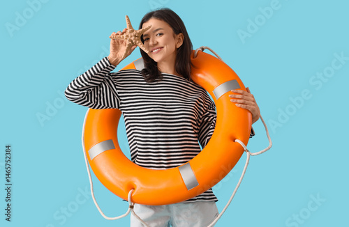 Young woman with starfish a...
