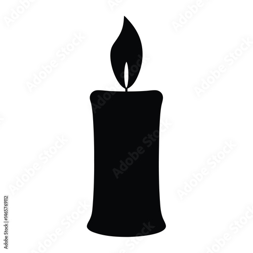 A black candle burning with a bright flame on a white background