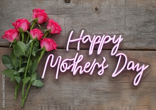Pink roses and 'Happy Mother's Day' neon sign.