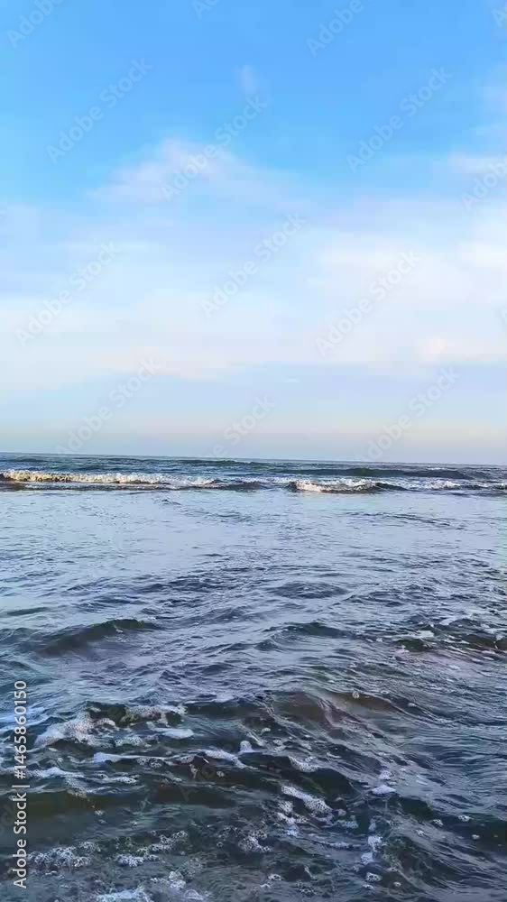 The ocean is calm and the sky is clear