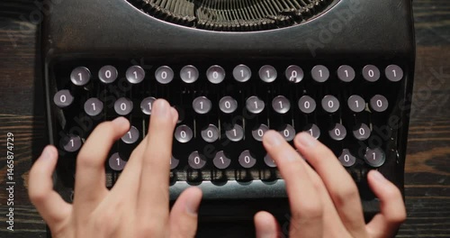 hands on typewriter