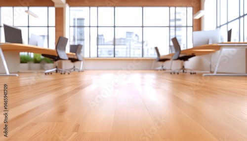 Fototapeta Naklejka Na Ścianę i Meble -  Modern office space with wood floors, desks, chairs, and large windows offering a city view