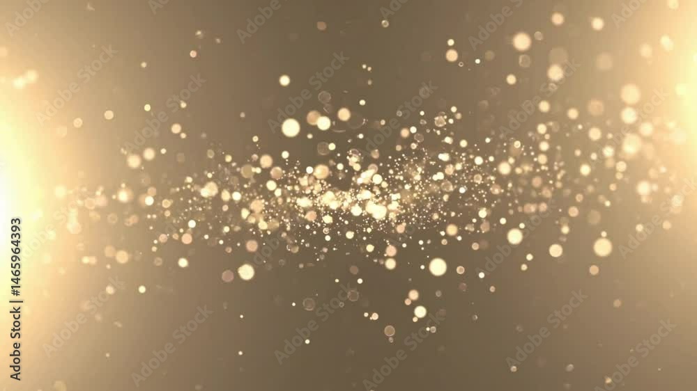 Golden glitter sparkles with glowing light effect for festive background