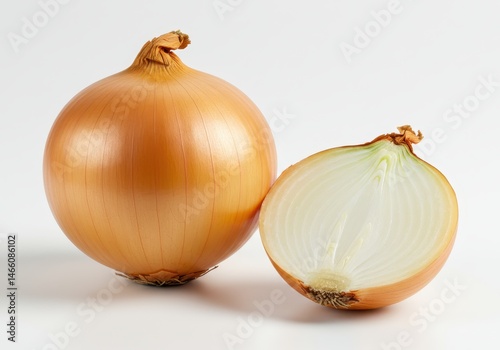 Wallpaper Mural Whole and halved yellow onion on a white surface ready for cooking Torontodigital.ca