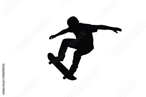 Silhouette of a Skateboarder Performing an Aerial Trick