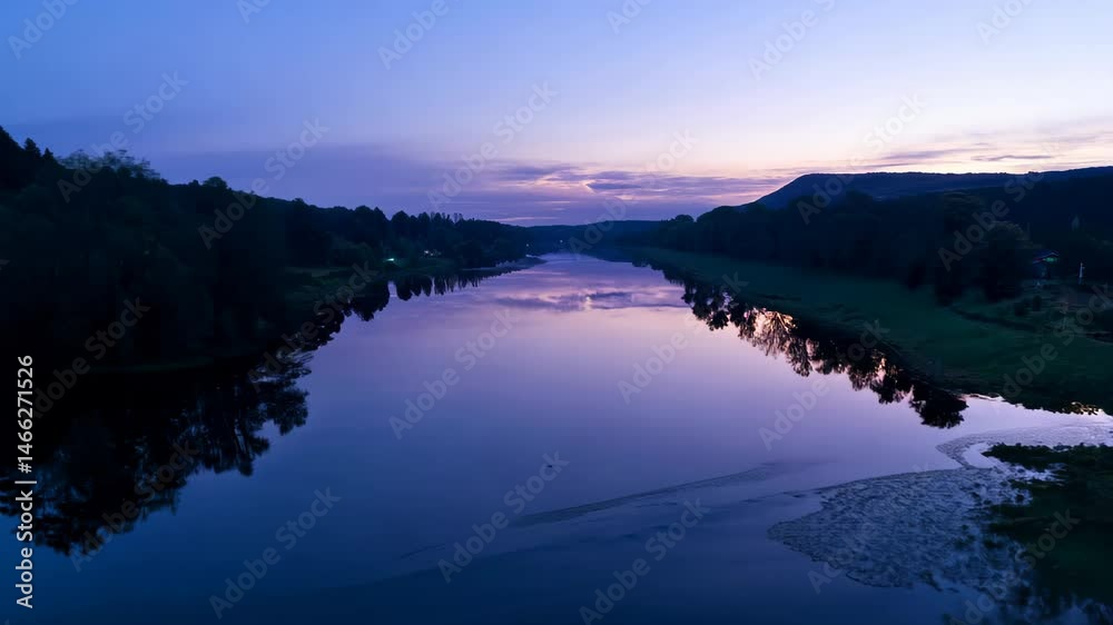 Tranquil Twilight River Scene with Hills and Stunning Reflections Tranquil Twilight River Scene with Hills and Stunning Reflections