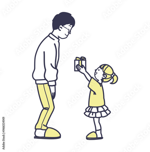 父の日にプレゼントを渡すこども