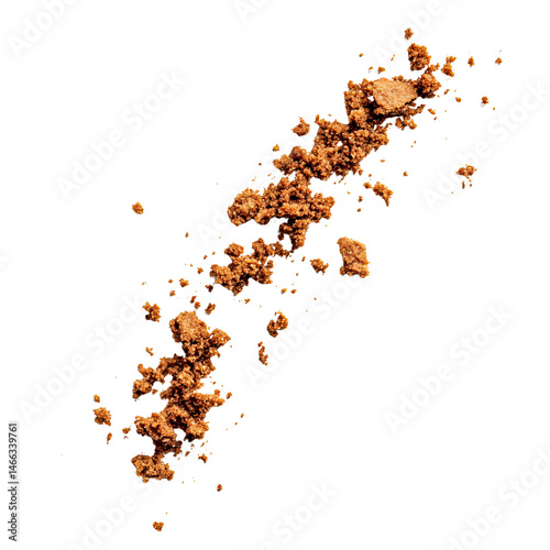 Crumbled gingerbread cookie crumbs on a transparent background, perfect for baking and holiday themed designs Sweet and spicy gingerbread crumbs texture