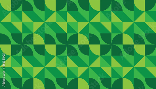 Nature-inspired seamless vector pattern with simple shapes and tonal green palette