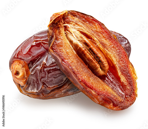 Foto Semi-dried dates and date fruit cut in half isolated on white background