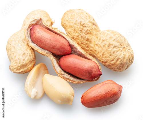 Peanuts whole and cracked isolated on white background. File contains clipping paths.