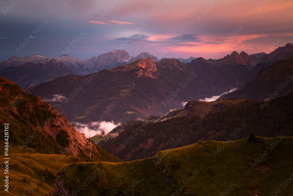 Colorful sunset in the Dolomite mountains at Passo Giau.