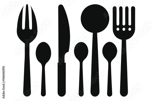 Flatware arrangement shows two forks, knife and spoons standing upright in a simple, elegant design
