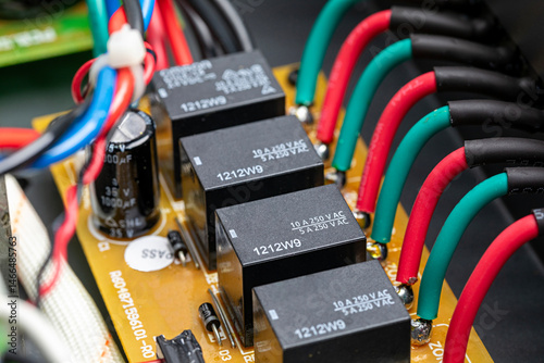 Audio relay circuit board in amplifier for connecting to speakers