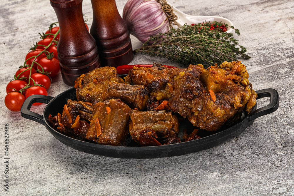 Baked oztail with tomato and carrot
