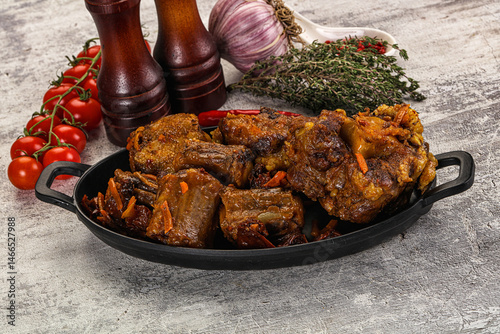 Baked oztail with tomato and carrot