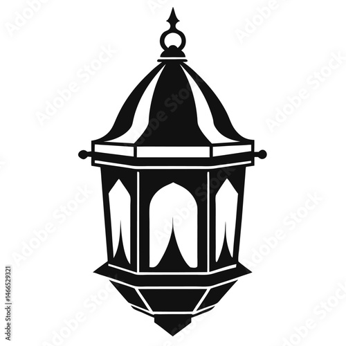 A vintage style hanging lantern shines brightly in its minimal black silhouette