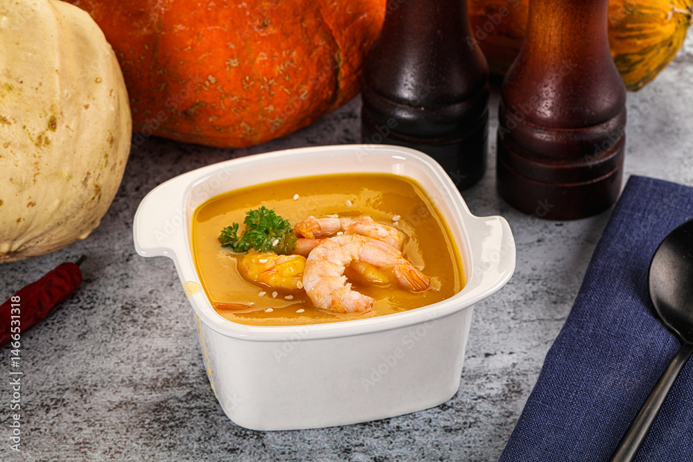 Pumpkin cream soup with prawns