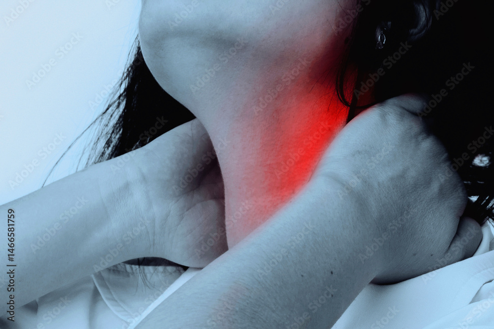 Neck pain. Working at a computer and stress cause neck pain. Horizontal image.