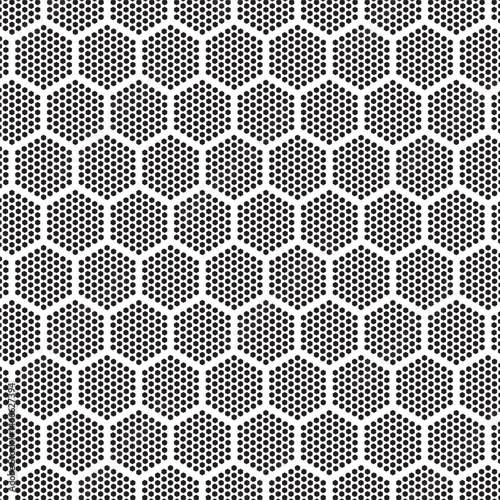 Seamless black and white hexagonal dot pattern, abstract geometric texture ideal for backgrounds, prints, or digital designs.