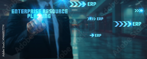 Businessman touches one technology point in their hand network connection on Enterprise Resource Planning (ERP), data integration, automation, cloud systems, technology, and futuristic solutions