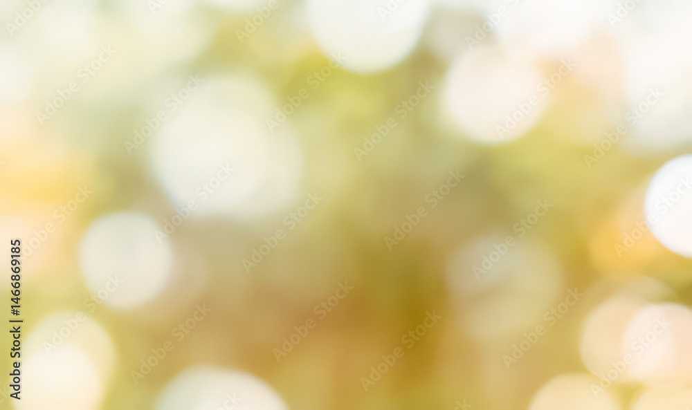 Abstract blurred background with bokeh lights in white yellow and green tones. Abstract blurred background with bokeh lights in white yellow and green tones.