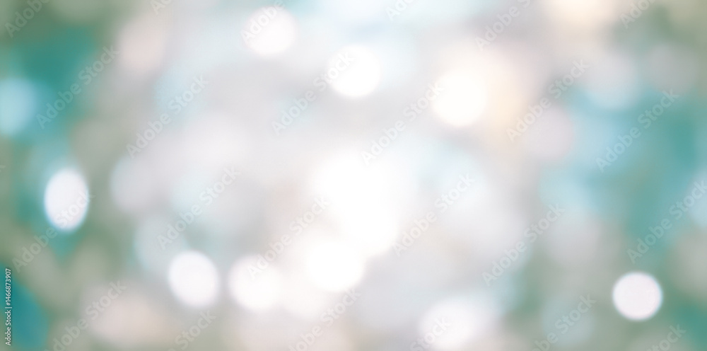 Abstract blurred background with bokeh effect in shades of white green and blue. Abstract blurred background with bokeh effect in shades of white green and blue.