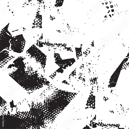 Fragmented black and white portrait reveals abstract facial features.