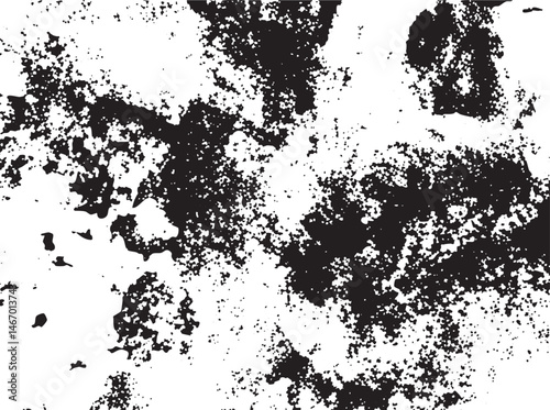 A textured abstract black and white reveals chaotic splatters across a predominantly dark background.