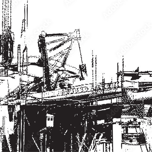 A large crane operates on a construction site overlooking a waterway.